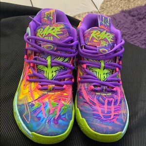 Puma Purple and Pink Sneakers with Graffiti Pattern